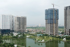 Việc phân biệt đối xử trong chính sách thuế gây nhiều khó khăn, bất lợi cho doanh nghiệp địa ốc. Ảnh: Dũng Minh