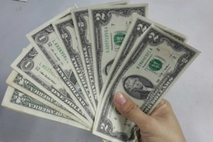 Mỗi lần về Tết tôi phải lì xì mất 5.000 USD