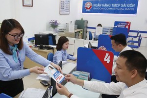 Các ngân hàng phải tăng chi phí tuân thủ khi triển khai Thông tư 13