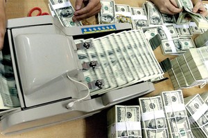 Một loạt đồng tiền hạ giá mạnh vì chiến tranh thương mại