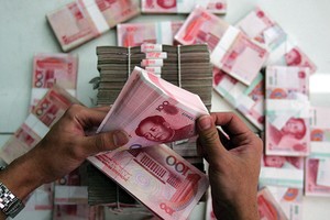 Đầu tuần này, đồng nhân dân tệ chạm mức thấp nhất so với USD trong 1 năm qua, dưới mức 6,8 nhân dân tệ đổi 1 USD