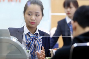 Trong tháng 11, chênh lệch huy động vốn - tín dụng VND đã thu hẹp 60.000-70.000 tỷ đồng và có thể co hẹp thêm 20.000-30.000 tỷ đồng trong tháng 12