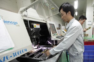 Doanh nghiệp mong muốn Luật Doanh nghiệp, Luật Đầu tư được sửa đổi thông thoáng hơn. Ảnh: Đức Thanh