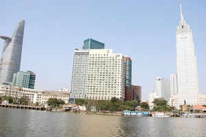 Việc siết cấp phép dự án mới tại trung tâm là một trong những nguyên nhân khiến dòng vốn vào bất động sản TP.HCM sụt giảm. Ảnh: Gia Huy 