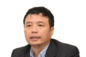 Ông Nguyễn Tú Anh, Phó vụ trưởng Vụ Chính sách tiền tệ (Ngân hàng Nhà nước).