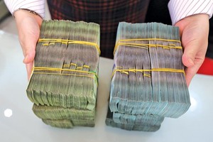 Phát hành trái phiếu tăng vốn cấp 2 chỉ là phương án tạm thời trong khi ngân hàng chưa tăng được vốn cấp 1. Ảnh: Đ.T