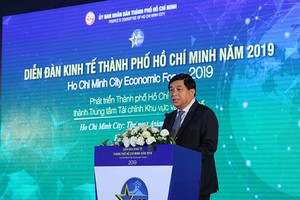 Bộ trưởng Bộ Kế hoạch Đầu tư Nguyễn Chí Dũng phát biểu tại Diễn đàn-Ảnh Lê Toàn