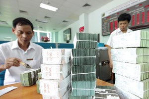 Nợ xấu vẫn tiềm ẩn nhiều rủi ro đối với an toàn, hiệu quả hoạt động của các tổ chức tín dụng. Ảnh: Đức Thanh