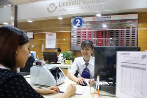 Tỷ giá trong năm nay được dự báo chỉ biến động ở mức 1 - 2%. Ảnh: Đức Thanh