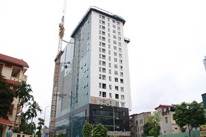 UBND quận Ba Đình vẫn chưa có phương án phá dỡ Toà nhà 18b Lê Trực (Ảnh: Minh hoạ)