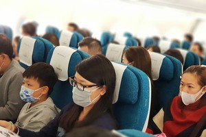 Các hành khách sẽ phải sử dụng khẩu trang trên máy bay và khi vào các nhà ga cảng hàng không tại Việt Nam.