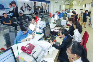 Xử lý được lượng lớn hồ sơ cơ cấu nợ trong một thời gian ngắn, đảm bảo không sai đối tượng là điều hết sức khó khăn cho các ngân hàng. Ảnh: Đức Thanh