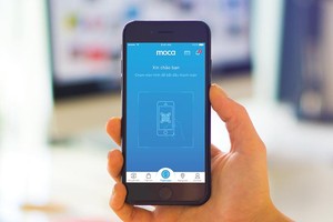 Chương trình Chuyển đổi số quốc gia đặt mục tiêu đến năm 2030, Việt Nam thuộc nhóm 50 nước dẫn đầu về chính phủ điện tử, với kinh tế số chiếm 30% tổng sản phẩm quốc nội. Trong ảnh: Thanh toán không dùng tiền mặt qua ví Moca.