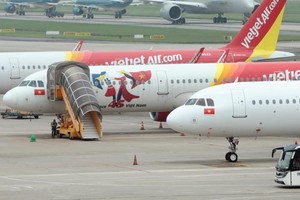 Không chỉ doanh nghiệp nhỏ và vừa, các tập đoàn lớn cũng bị ảnh hưởng nghiêm trọng, trong đó có Vietjet. Ảnh: Đ.T