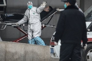 WHO chú ý tới các ca viêm phổi ở Vũ Hán trước khi nhận được thông báo của Trung Quốc. Ảnh: AFP.