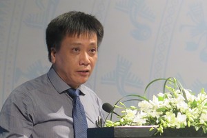 Đại diện Trung tâm Thông tin và dự báo kinh tế-xã hội quốc gia (NCIF) TS. Trần Toàn Thắng tham luận tại Hội thảo. Ảnh: Lê Quân