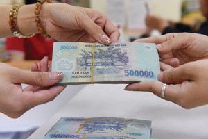 Tín dụng bất động sản bị siết dần khiến các doanh nghiệp địa ốc tìm đến kênh trái phiếu, Ảnh: Dũng Minh