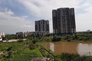 Dự thảo nghị định sẽ có cơ chế xử lý đối với các thửa đất do Nhà nước quản lý nằm xen kẽ trong các dự án đầu tư, dự án nhà ở. Ảnh: Thành Nguyễn.