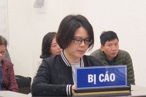 Bán đất ảo bằng sổ đỏ của người vay tiền, nữ "giám đốc" bỏ trốn 9 năm lĩnh án 12 năm tù