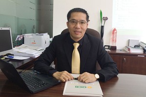 Ông Trương Đình Long, Phó tổng giám đốc OCB.