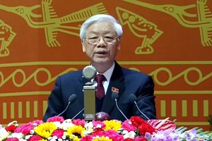 Tổng Bí thư Nguyễn Phú Trọng trình bày Báo cáo của BCH Trung ương khóa XI về các văn kiện Đại hội XII