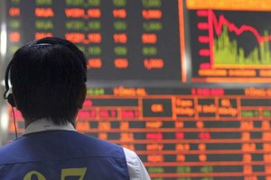 Cùng các dự án FDI, nhà đầu tư ngoại cũng đẩy mạnh góp vốn, mua cổ phần tại các doanh nghiệp Việt. Ảnh minh họa: Bloomberg