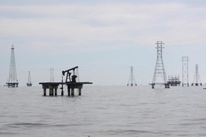 Một mỏ bơm dầu ở Cabimas, Venezuela (Ảnh: Reuters)