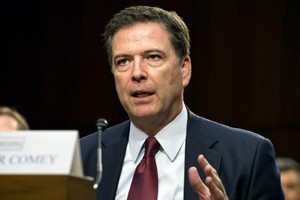 Giám đốc FBI James Comey. Ảnh: Francis Rivera