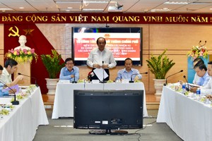 Bộ trưởng, Chủ nhiệm Văn phòng Chính phủ, Tổ trưởng Tổ công tác của Chính phủ làm việc với Tập đoàn Dệt may (Vinatex) ngày 20/6. Ảnh: Nhật Bắc