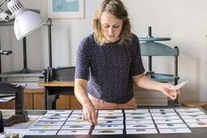 Kiếm thêm việc làm không phải lúc nào cũng giúp bạn thoát nợ. Ảnh: AFP