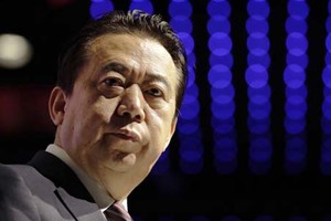 Chủ tịch Interpol Mạnh Hoành Vĩ phát biểu tại Singapore ngày 4/7/2017. Ảnh: AP.