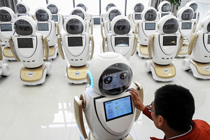 Robot đang ngày càng phổ biến trong nhiều lĩnh vực. Ảnh: AFP.