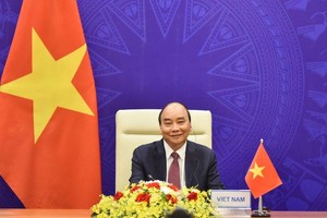 Chủ tịch nước Nguyễn Xuân Phúc tham dự Hội nghị thượng đỉnh về Khí hậu (Ảnh: BNG)