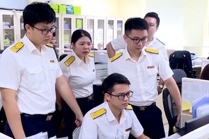 Ngành Thuế đặt mục tiêu tối thiểu 90% mức độ hài lòng của người dân, doanh nghiệp. Ảnh: TN