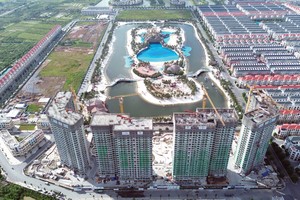 Đầu tư dự án bất động sản luôn cần nguồn vốn lớn. Ảnh: Dũng Minh.