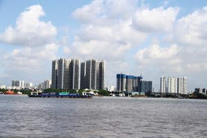 Thị trường căn hộ đang có được bệ đỡ từ nhu cầu thực cao. Ảnh: Bình Minh.