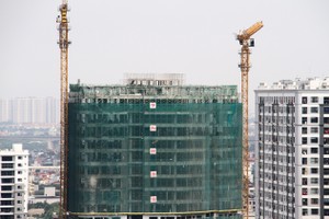 Thanh khoản thị trường căn hộ đang chịu nhiều sức ép từ lãi suất tăng. Ảnh: Thành Nguyễn.