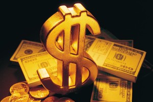 Vàng giao dịch ở mức cao sau thông điệp của Fed