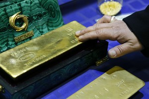 Giá vàng ngày 11/12: Giá vàng bị mắc kẹt