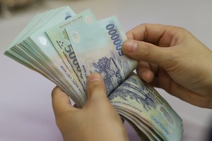 Một công ty mua bán nợ báo lãi giảm 50% 