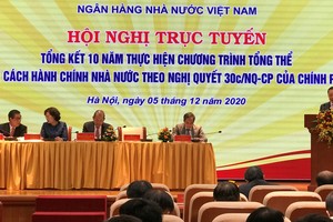 Ông Đào Minh Tú, Phó Thống đốc thường trực Ngân hàng Nhà nước phát biểu tại Hội nghị.