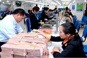 Tín dụng tăng có lo thanh khoản?