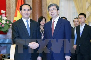 Chủ tịch nước Trần Đại Quang tiếp Chủ tịch ADB Takehiko Nakao. (Ảnh: Nhan Sáng/TTXVN)