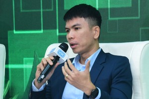 Ông Võ Quốc Khánh, Phó tổng giám đốc Công ty EY Việt Nam chia sẻ tại hội thảo Báo Đầu tư tổ chức ngày 4/12. Ảnh Dũng Minh