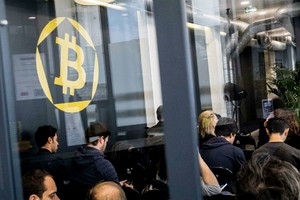 Tâm lý mua vào vẫn chi phối thị trường Bitcoin. Ảnh: Bloomberg