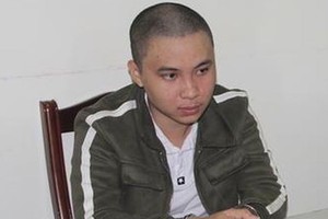 Nguyễn Đức Huy tại cơ quan công an.