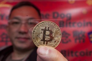 Thái Lan cấm các ngân hàng có hoạt động liên quan đến tiền ảo. Ảnh: EPA