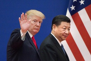 Tổng thống Donald Trump (trái) và Chủ tịch Tập Cận Bình (Ảnh: AFP)