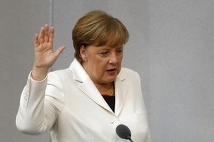 Bà Angela Merkel tuyên thệ nhậm chức thủ tướng Đức ngày 14/3. Ảnh: Reuters.