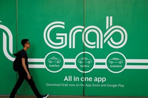 Bên ngoài văn phòng của Grab tại Singapore. Ảnh: Reutes